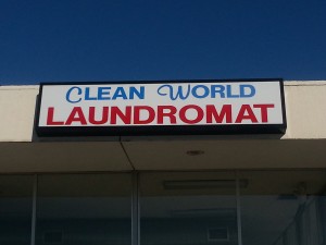 Cabinet sign for Clean World Laundromat St Louis